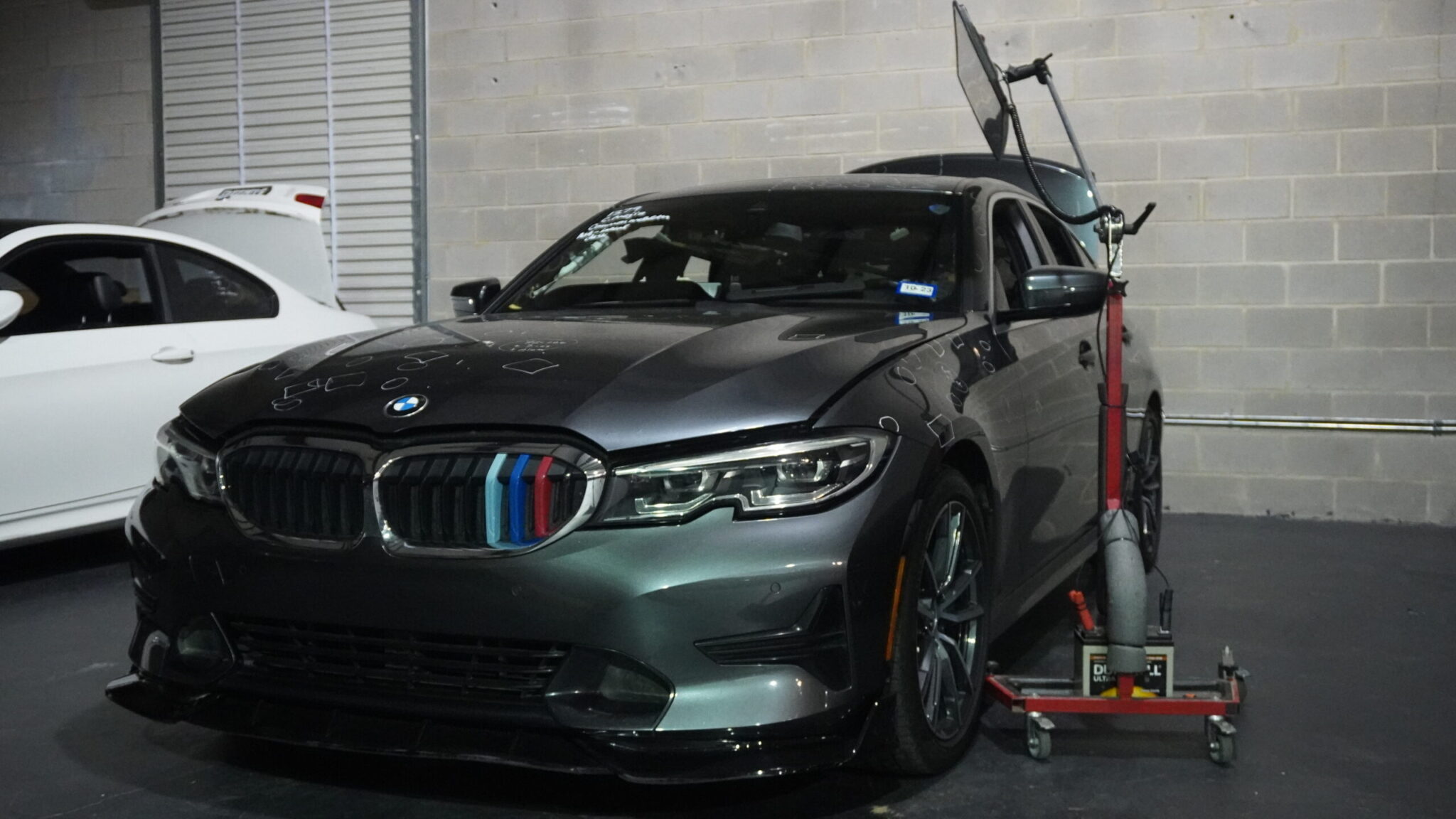 BMW front end after hail damage, Killeen shop