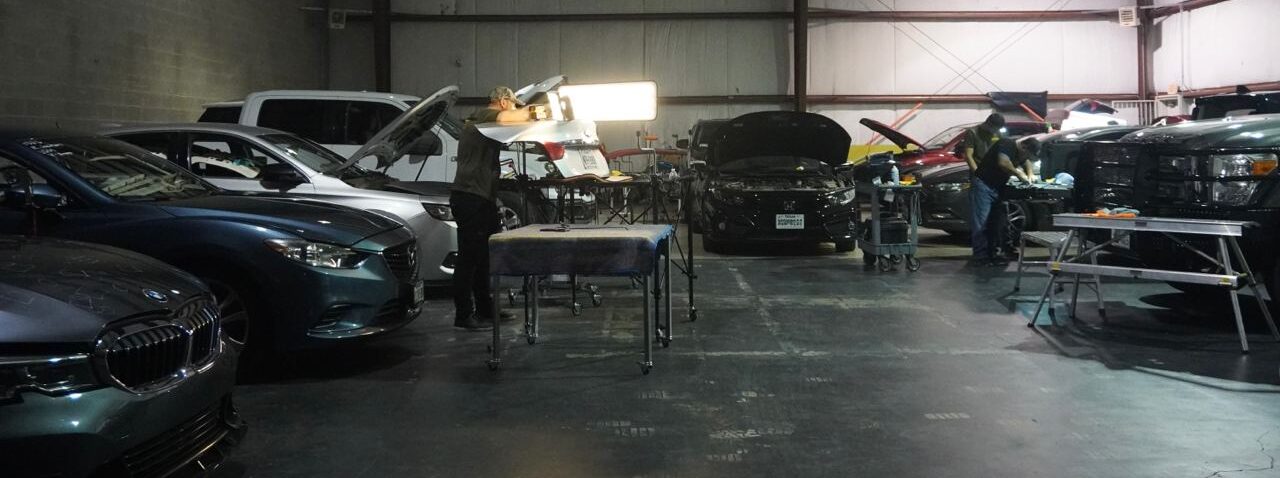 Paintless dent repair on a vehicle panel in Killeen